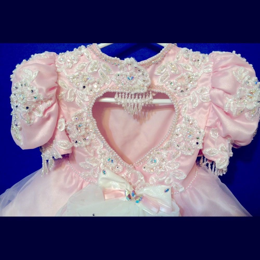Pageant dress. Multi award winning. Grand champion pink dress 2T
